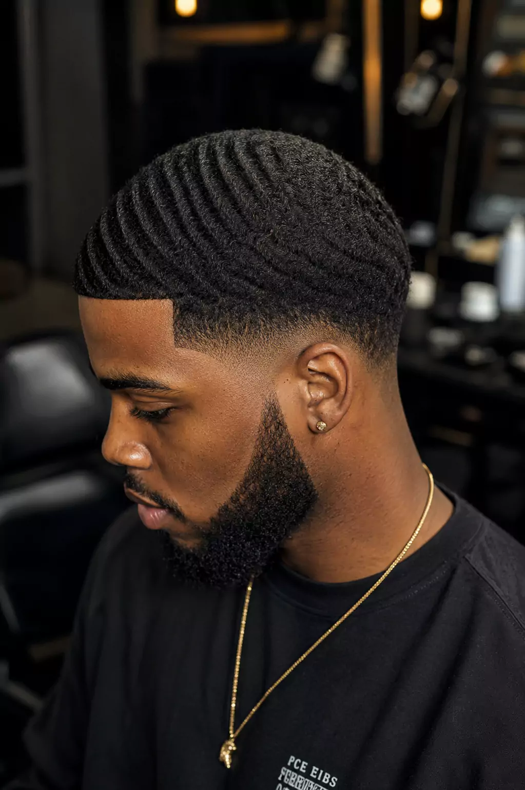 360 waves with low taper fade haircut for Black men