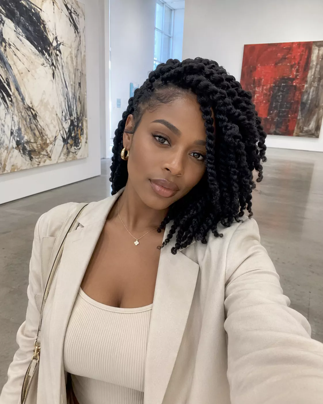 Side-swept Brazilian wool twists with soft face-framing volume