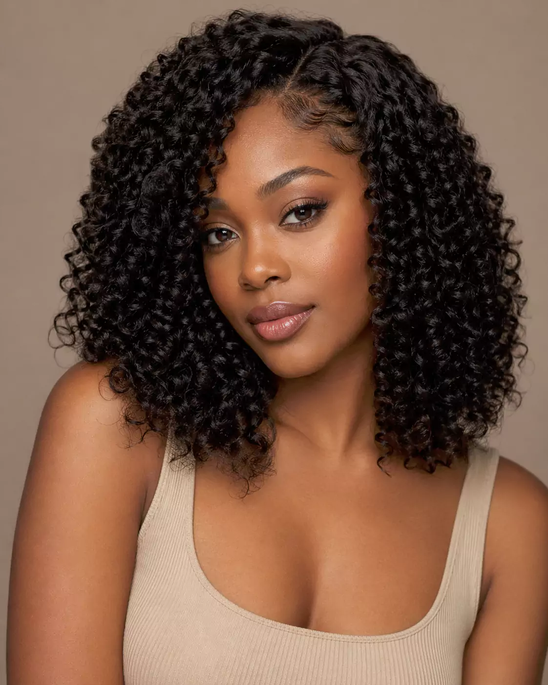 Crochet protective hairstyles for Black women with curly crochet hair, crochet twists, and crochet faux locs over a braided base