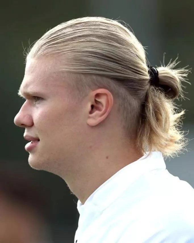 Erling Haaland long flow soccer player hairstyle