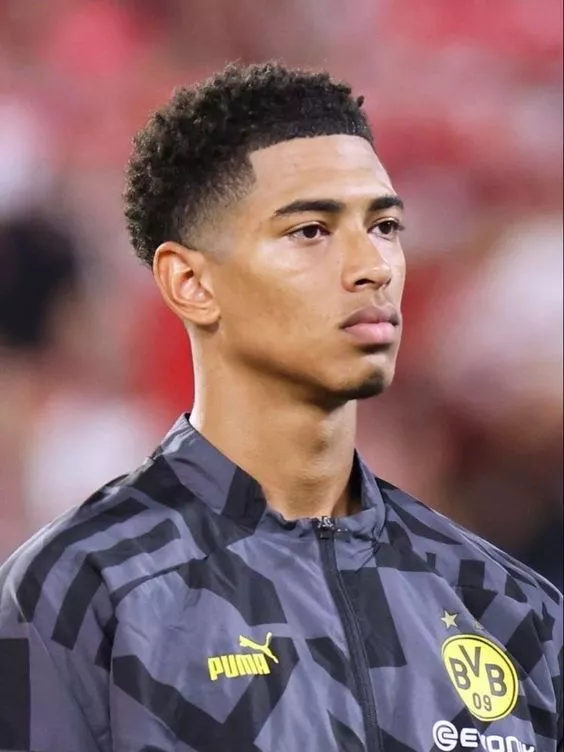 Jude Bellingham curly taper fade soccer player haircut