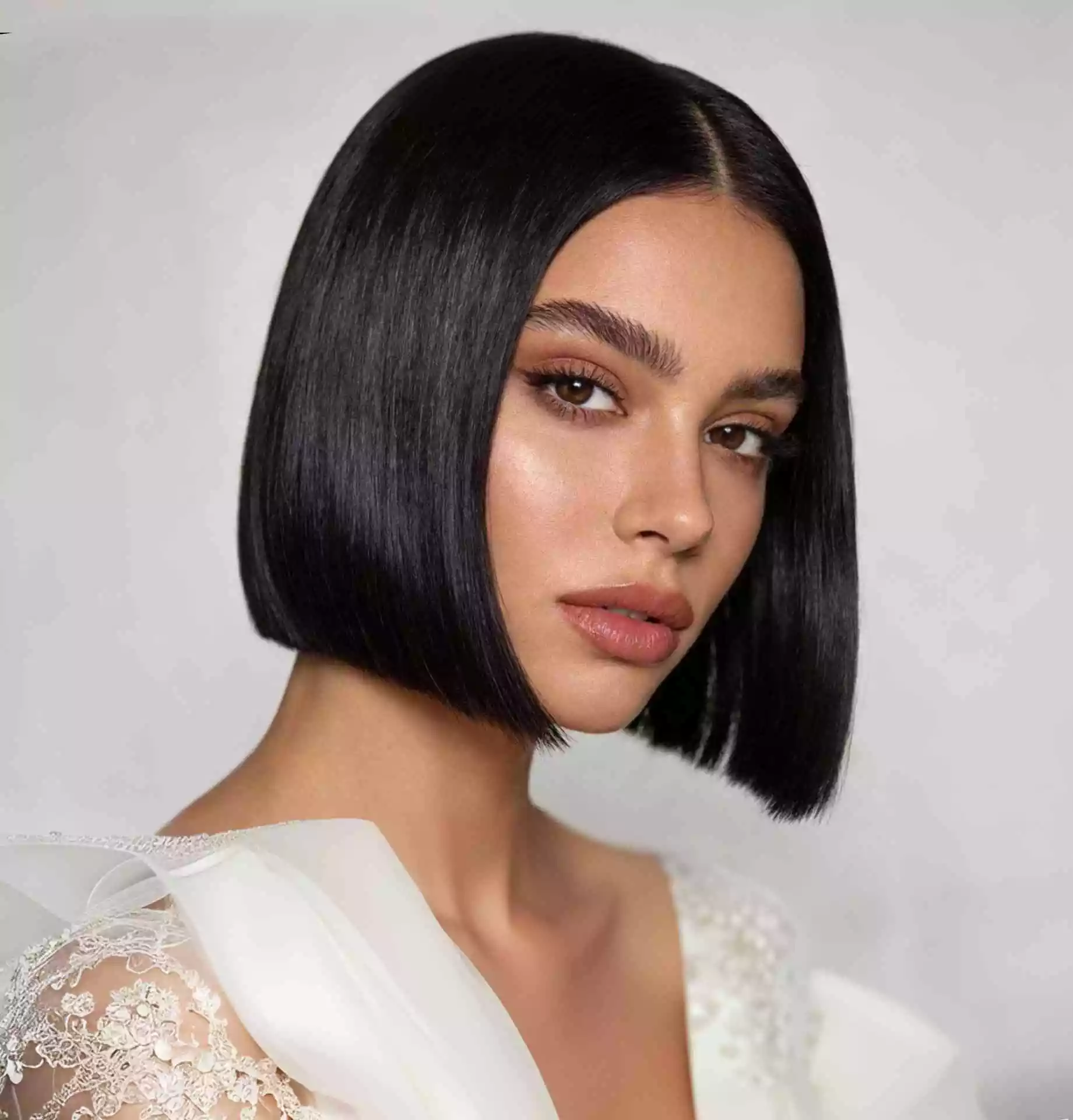 Classic chin-length blunt bob haircut for straight hair with crisp blunt ends