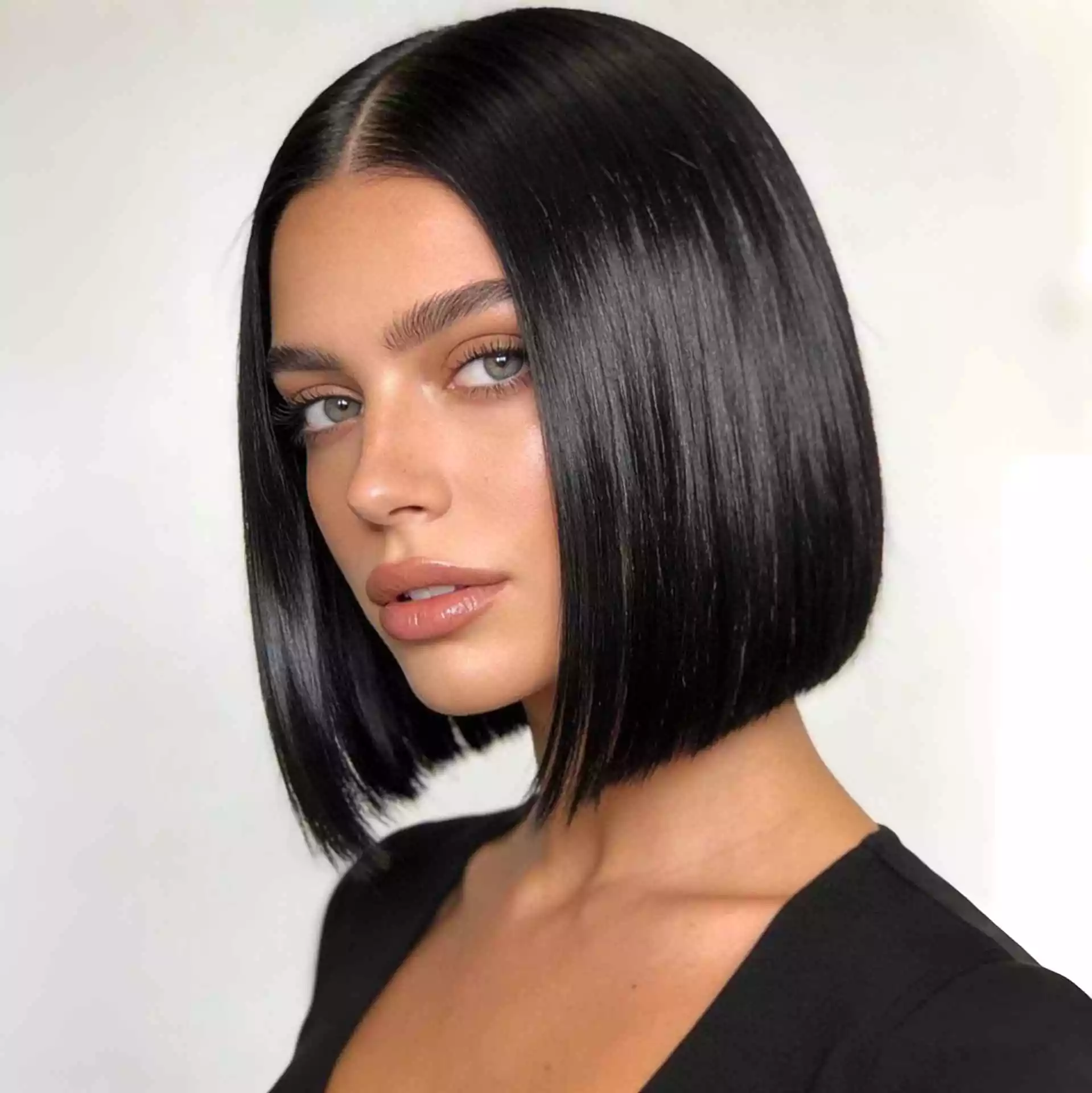 Blunt bob haircut hero: sleek one-length blunt bob haircut with sharp blunt ends and a polished silhouette