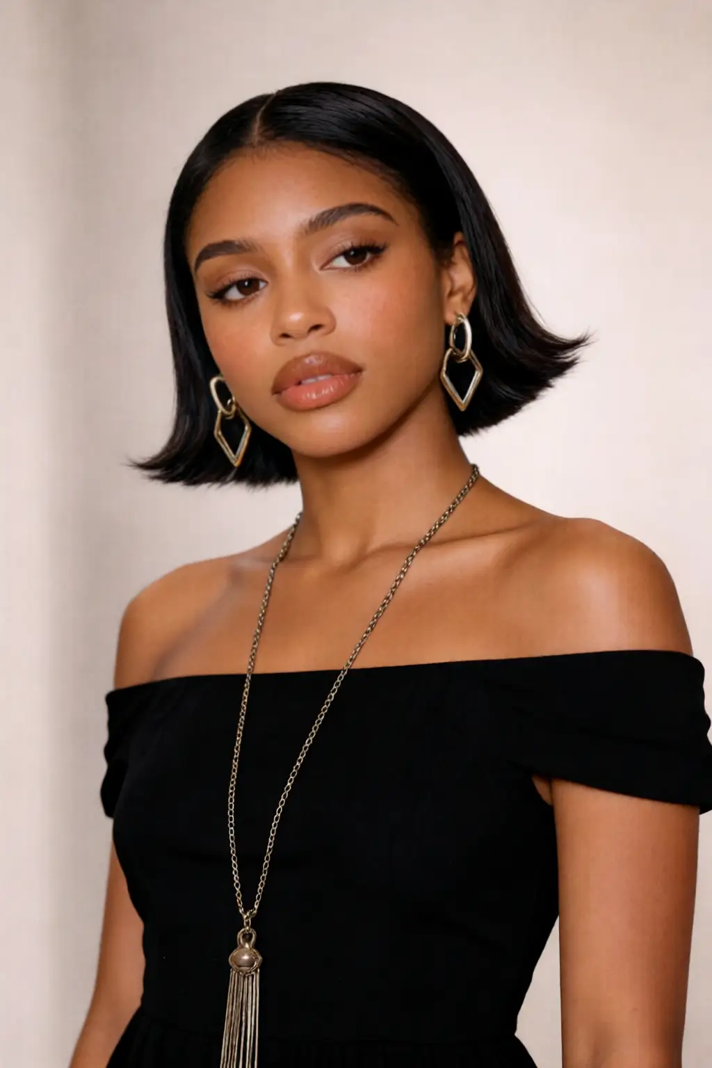Flipped bob haircut structure 2026 with outward flipped ends on fine straight hair, showing jawline contour and face-framing silhouette