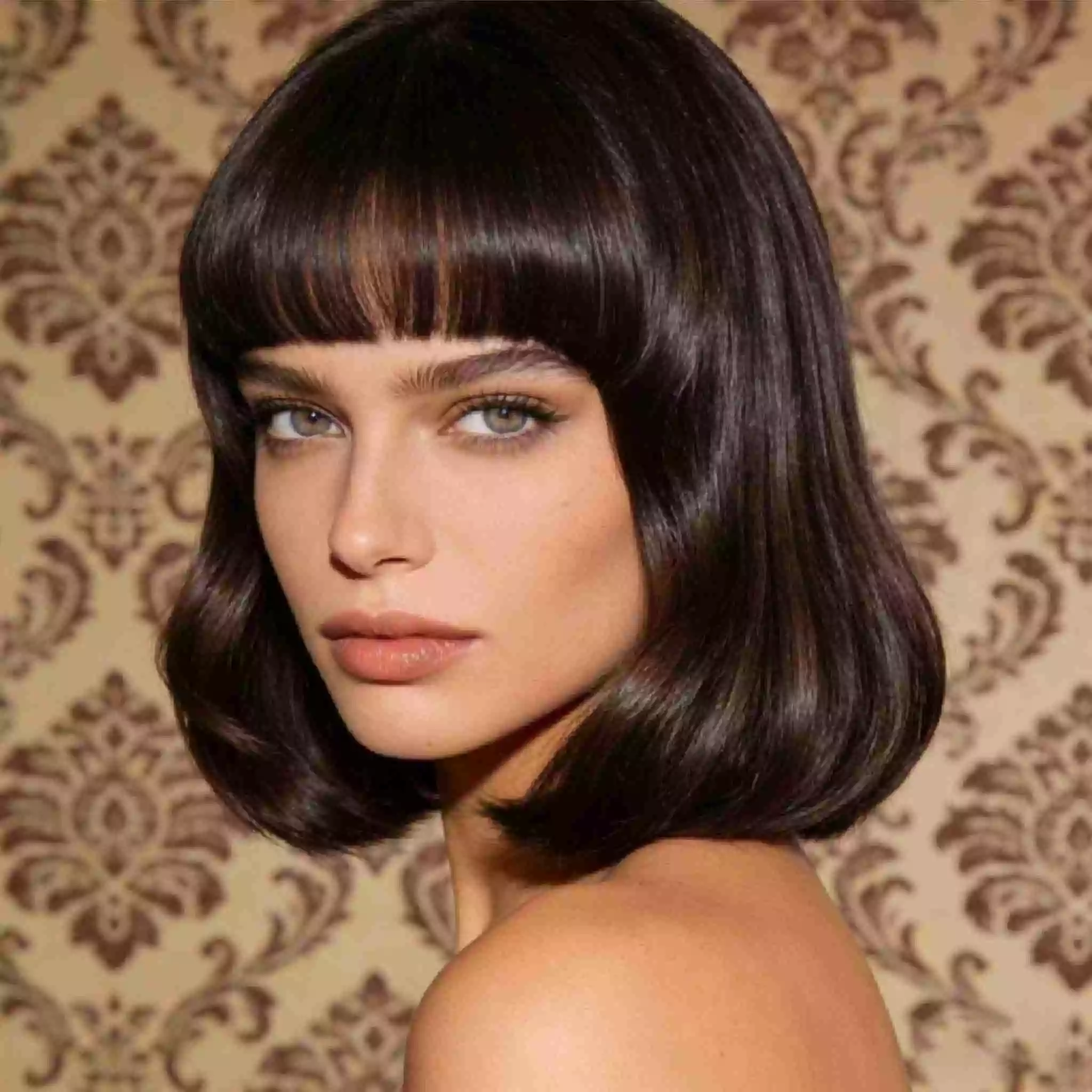 Bottleneck bangs French bob haircut 2026 tapered face-slimming fringe