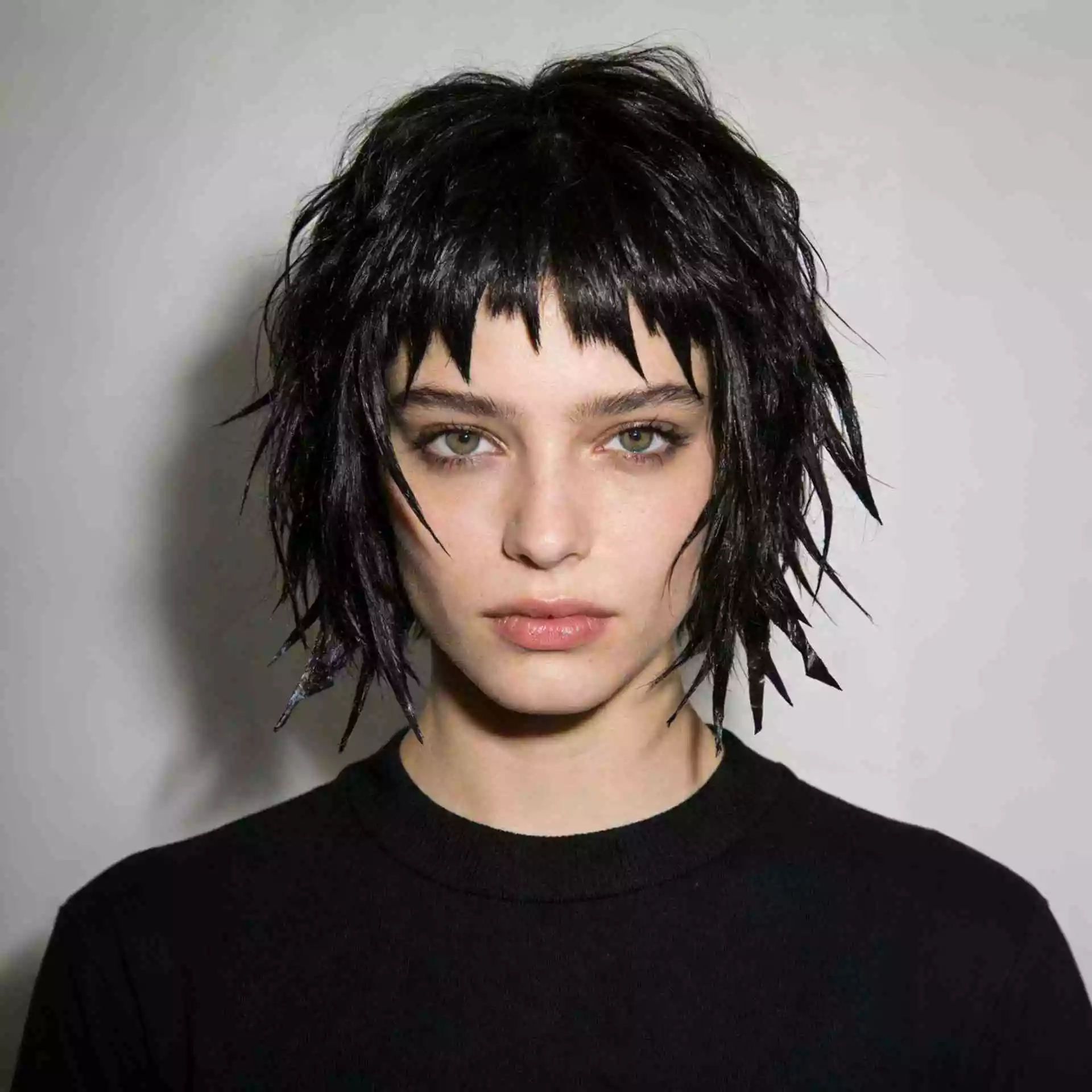 Choppy layered bob haircut, piecey texture, separated ends, edgy look