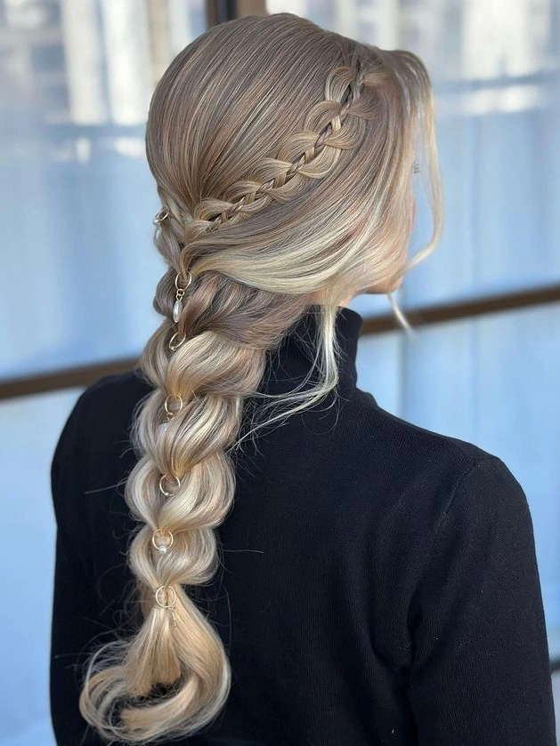 Various types of braided hairstyles including French braid, Dutch braid, and box braids