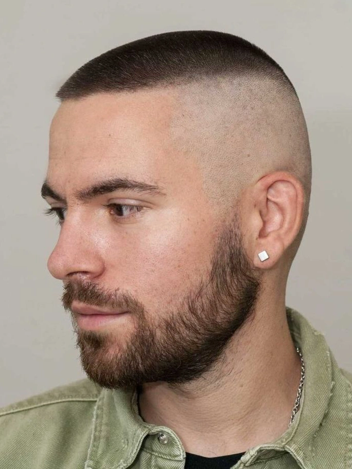 High and tight buzz cut - military style with shaved sides and longer top