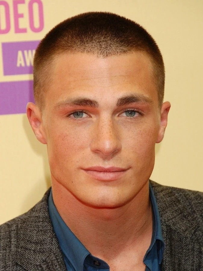 Burr cut hairstyle - short textured buzz cut with slight hair coverage