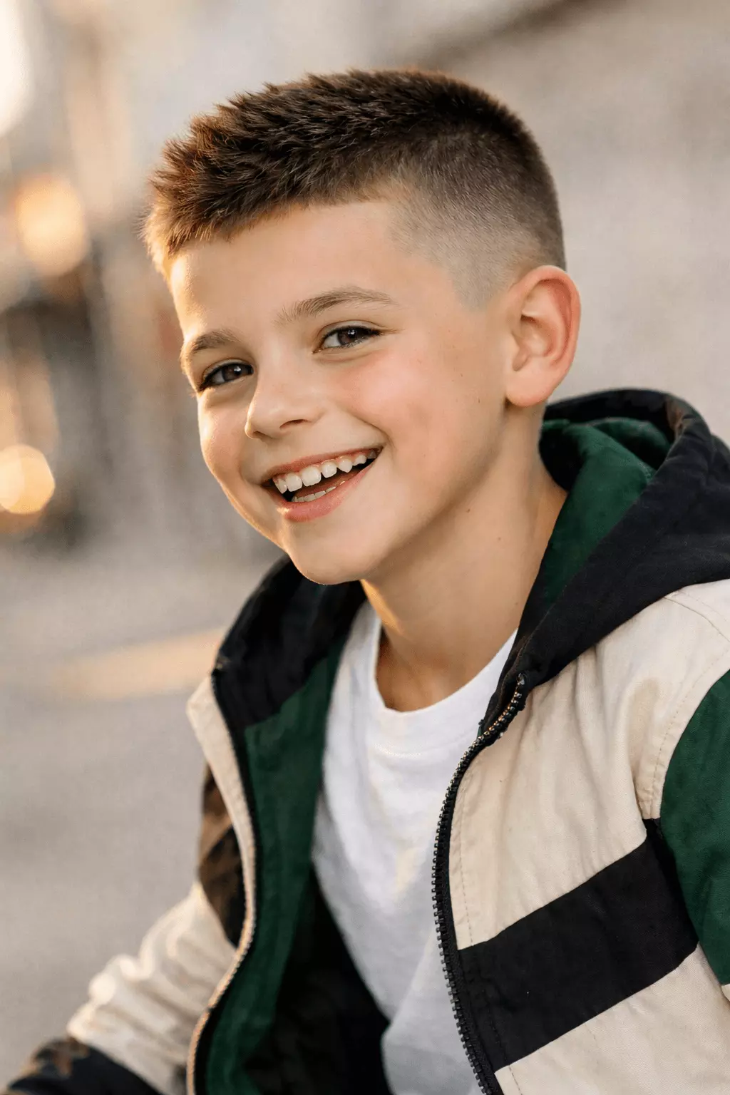 Low fade buzz cut for boys showing gradual side blending and clean finish