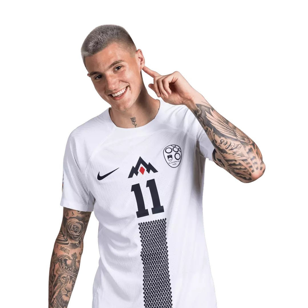 Benjamin Šeško with a platinum bleached buzz cut at #2–#3 guard length, even short top, soft taper on sides, natural hairline edge, athletic footballer close-up, stadium daylight lighting, realistic hair stubble texture