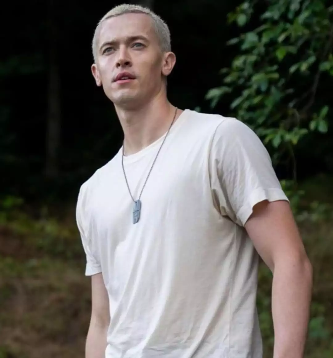 Tom Blyth buzz cut portrait