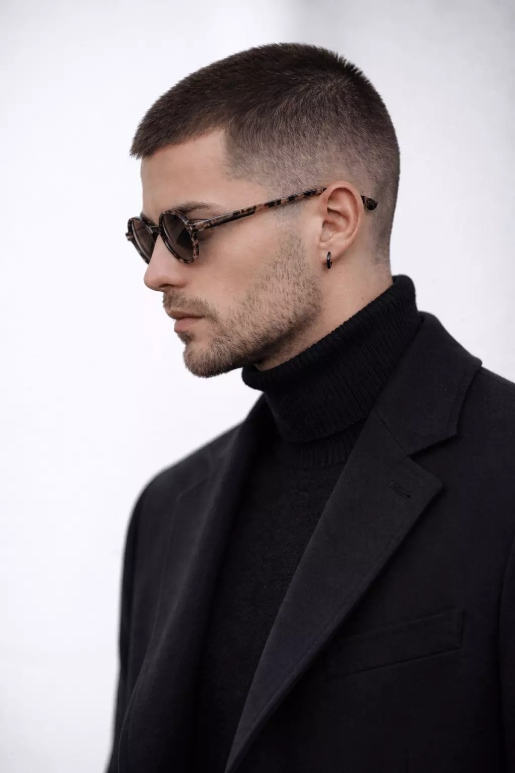 Low fade #3 buzz cut showing balanced width and soft transitions, modern everyday look.