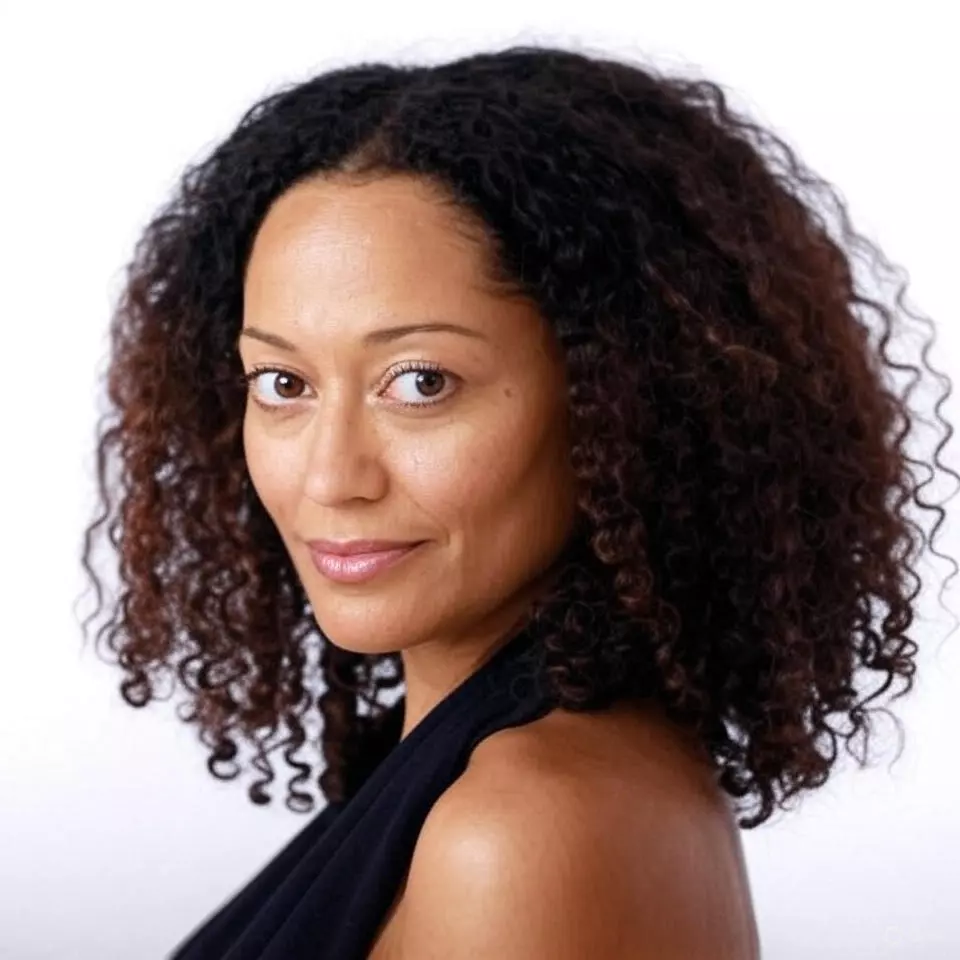 Tracee Ellis Ross with her iconic natural curls styled into a shape-shifter cut