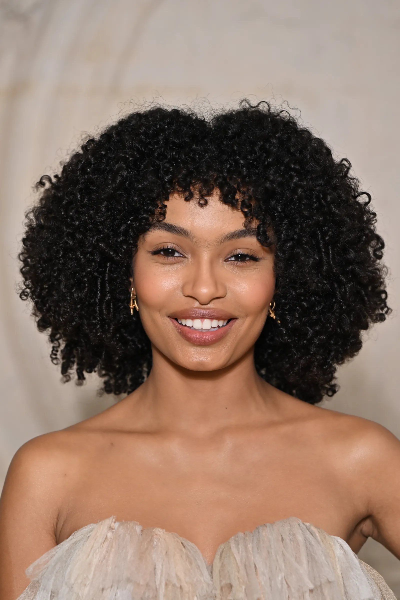 Yara Shahidi's twist-outs curly hairstyle, clear curl definition, showcasing natural hair texture