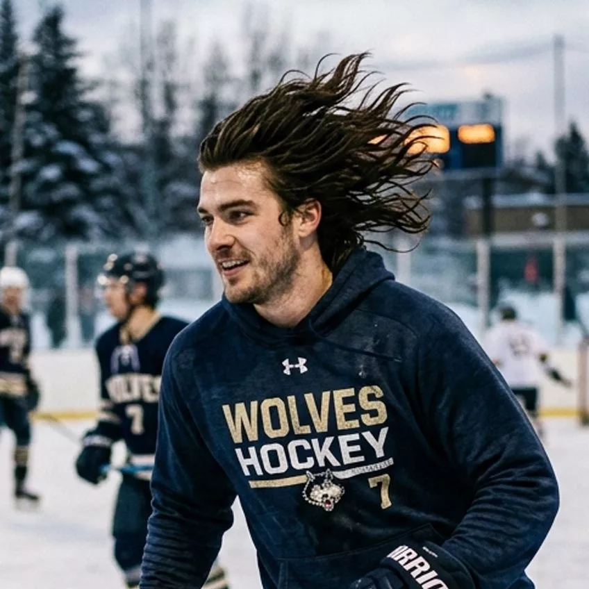 Hockey flow haircut for men with longer athletic movement