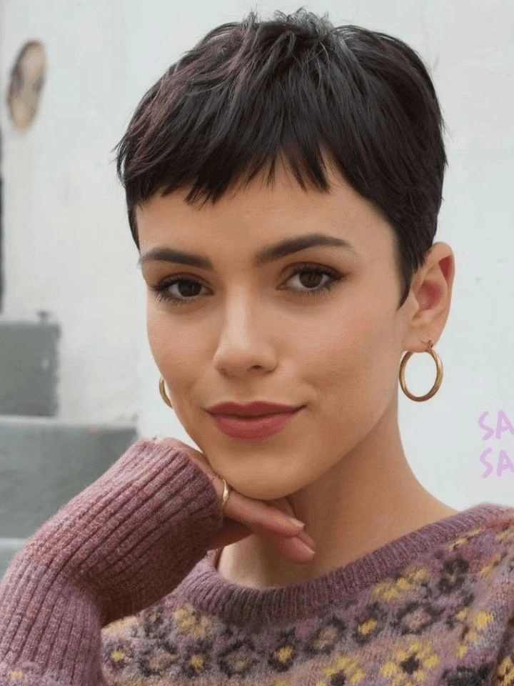 Classic pixie cut with cropped sides and textured crown