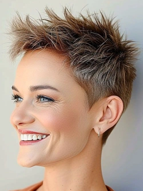 Spiky pixie hairstyle: 3cm upright spikes with matte wax