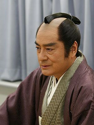 Edo period samurai with shaved sakayaki forehead and chonmage topknot