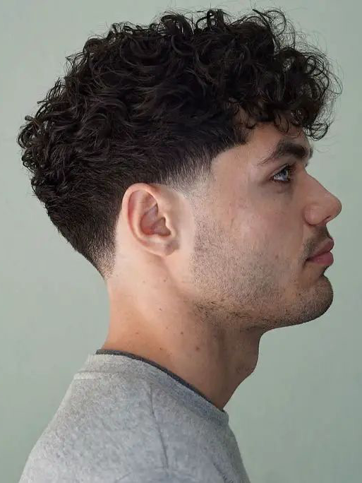 Low taper fade haircut diagram showing gradual hair transition from ears to crown